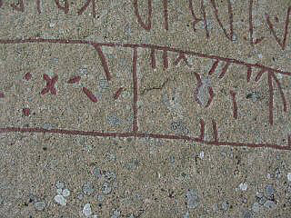 De stavlösa runorna på stenen